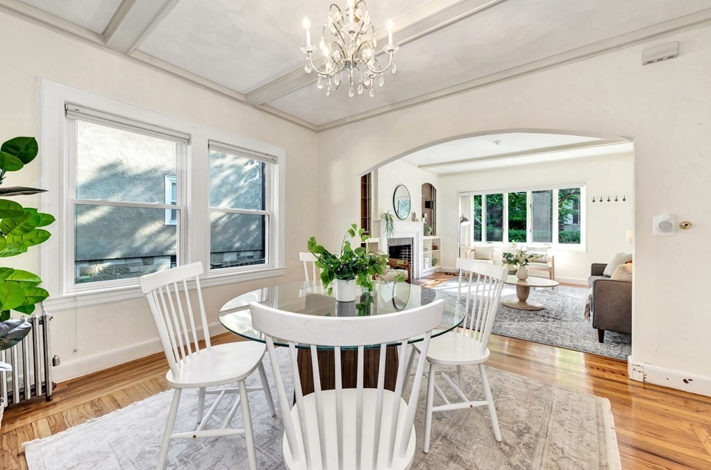 34 Harvard Street, Unit 1 Arlington, MA 02476 - Photo 12 of 36 a view of a dining room with furniture window and outside view