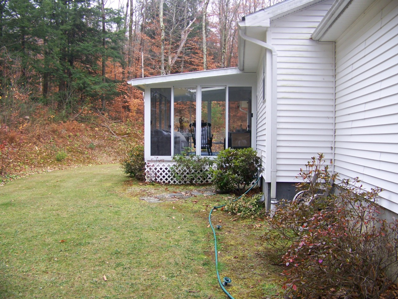 103 Algerie Road Becket, MA 01223 - Photo 6 of 37 a view of a house with backyard and garden