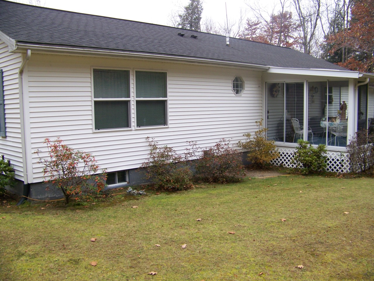 103 Algerie Road Becket, MA 01223 - Photo 8 of 37 a view of a house with a yard and plants