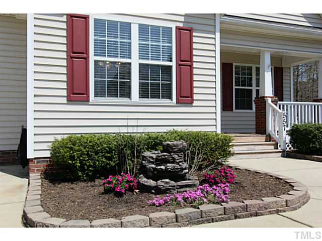 557 Axum Road Willow Spring, NC 27592 - Photo 3 of 25 a front view of a house with a yard