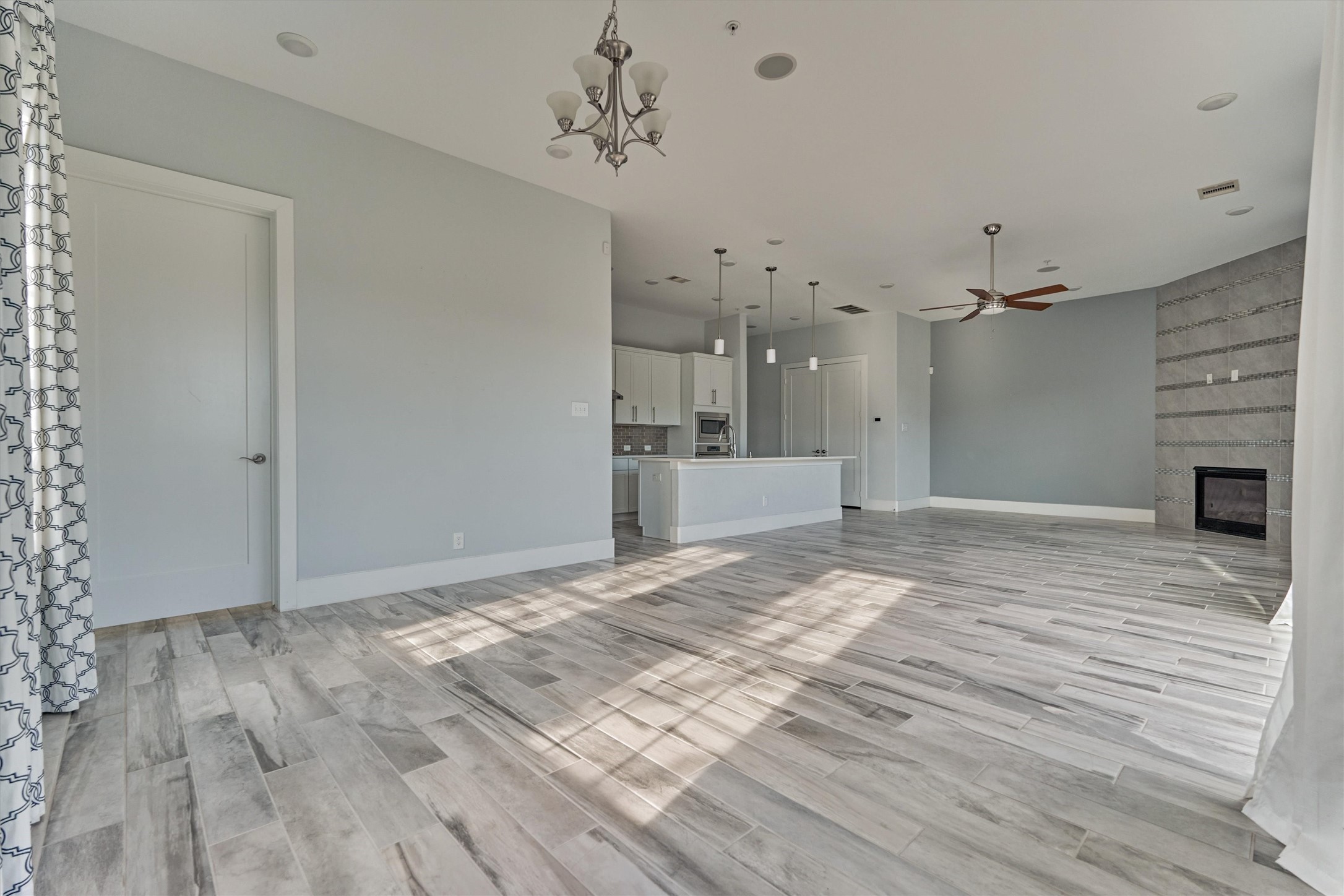2113 Solstice Boulevard Spring, TX 77386 - Photo 14 of 48 a view of a livingroom with a fireplace