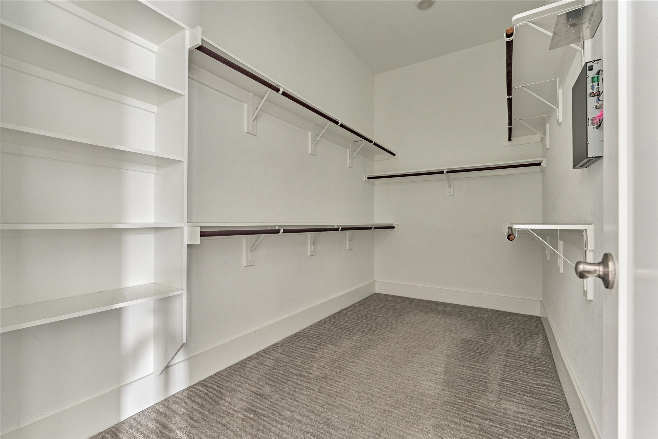 2113 Solstice Boulevard Spring, TX 77386 - Photo 30 of 48 a view of walk in closet with empty racks