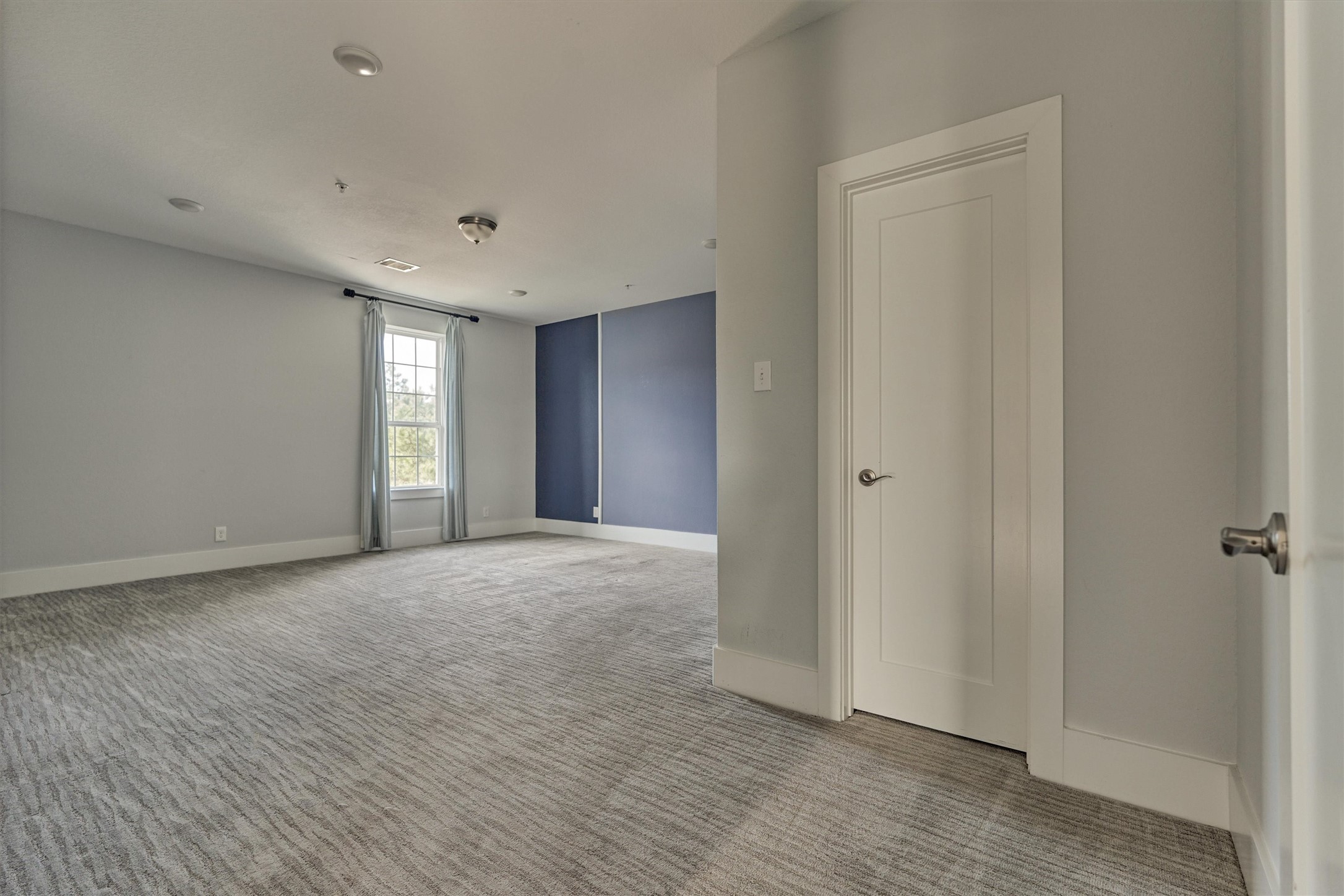 2113 Solstice Boulevard Spring, TX 77386 - Photo 36 of 48 a view of empty room with wooden floor