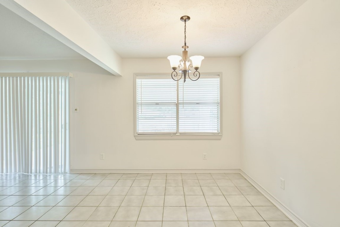 619 Pinewood Drive Conroe, TX 77385 - Photo 22 of 44 a view of an empty room with a window