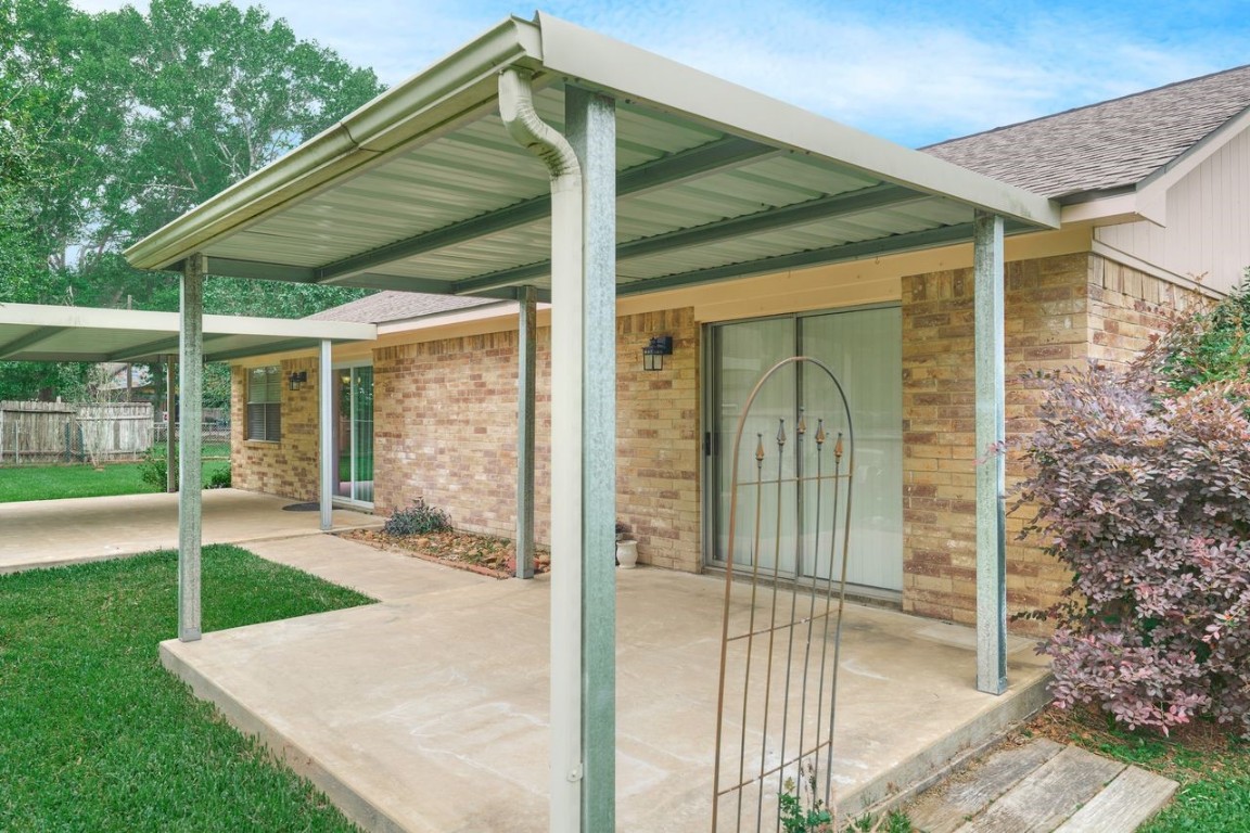 619 Pinewood Drive Conroe, TX 77385 - Photo 40 of 44 a view of outdoor space yard and porch
