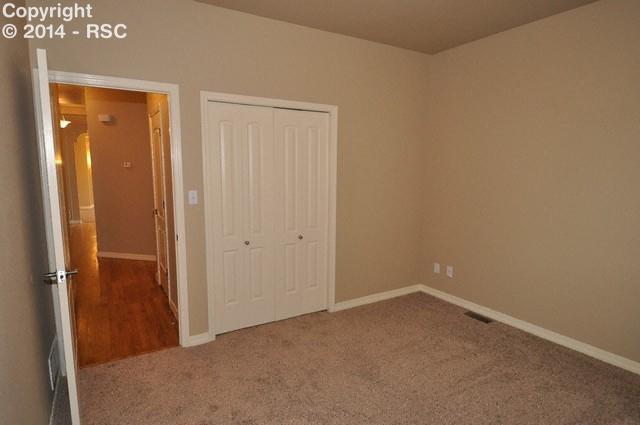 15892 Maple Hill Road Monument, CO 80132 - Photo 10 of 22 Second bedroom on main level