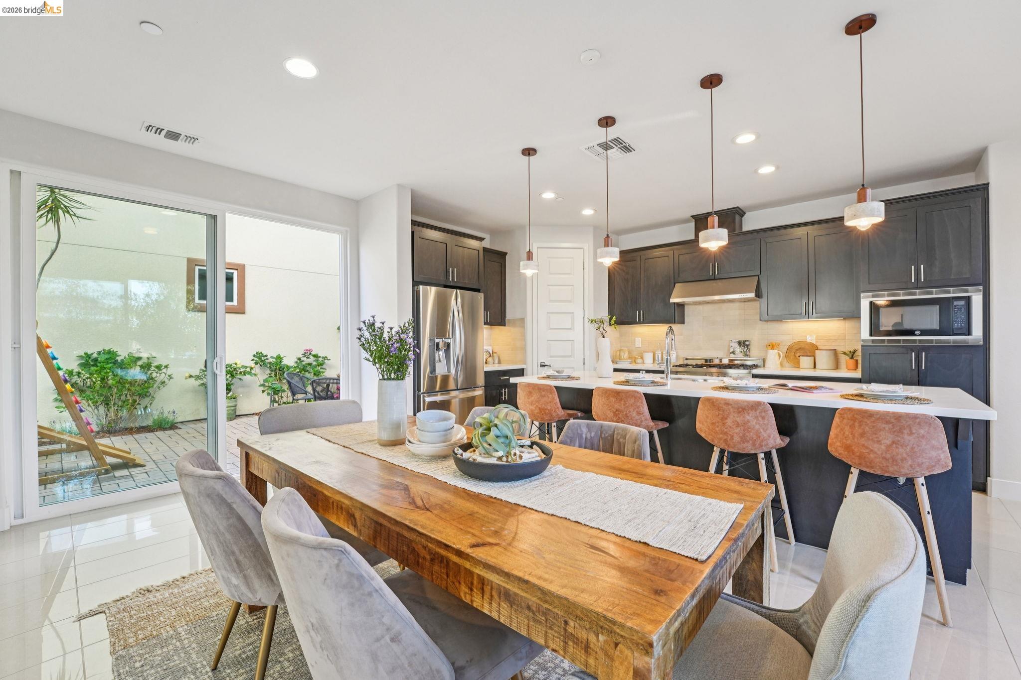 2770 Bette Street Alameda, CA 94501 - Photo 13 of 60 a dinning room and kitchen with a large window