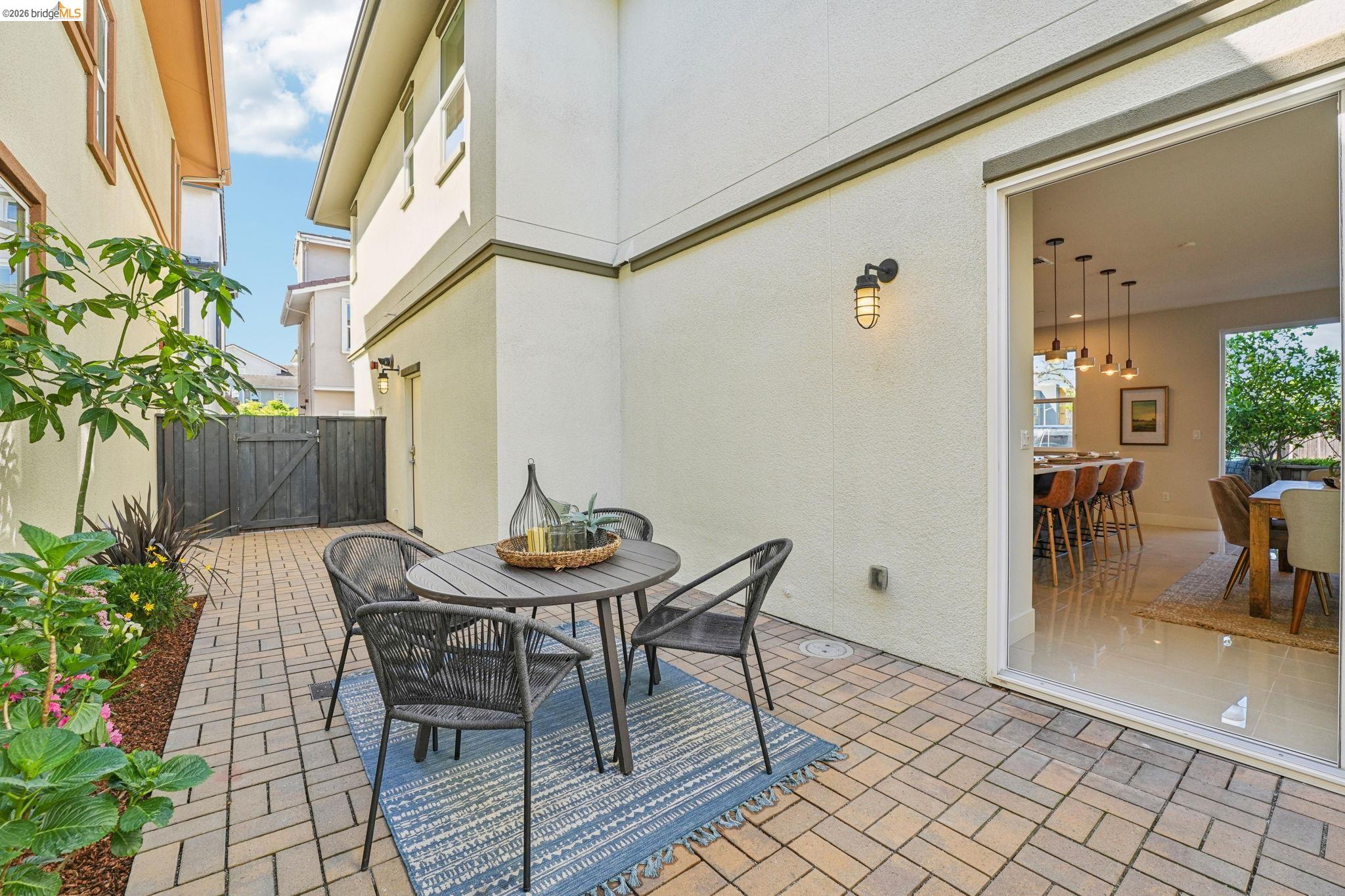 2770 Bette Street Alameda, CA 94501 - Photo 14 of 60 a view of a dinning table and chairs in patio of the house