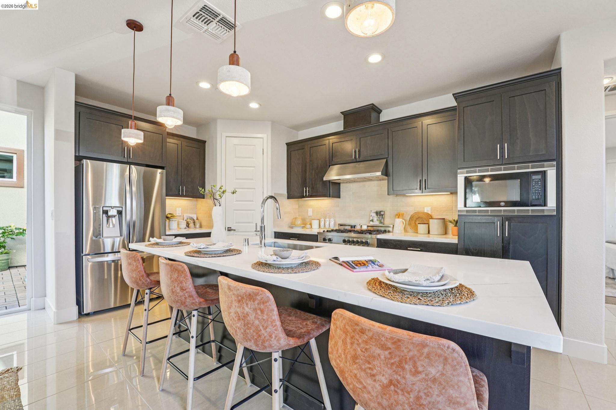 2770 Bette Street Alameda, CA 94501 - Photo 18 of 60 a kitchen that has a table and chairs in it