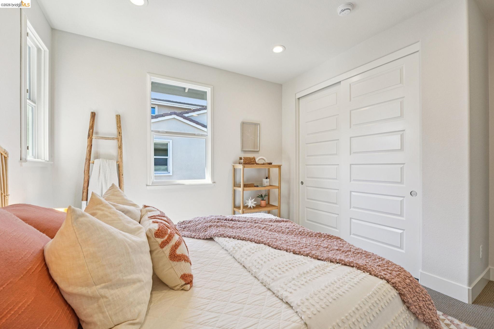 2770 Bette Street Alameda, CA 94501 - Photo 37 of 60 a bedroom with a bed and wooden floor