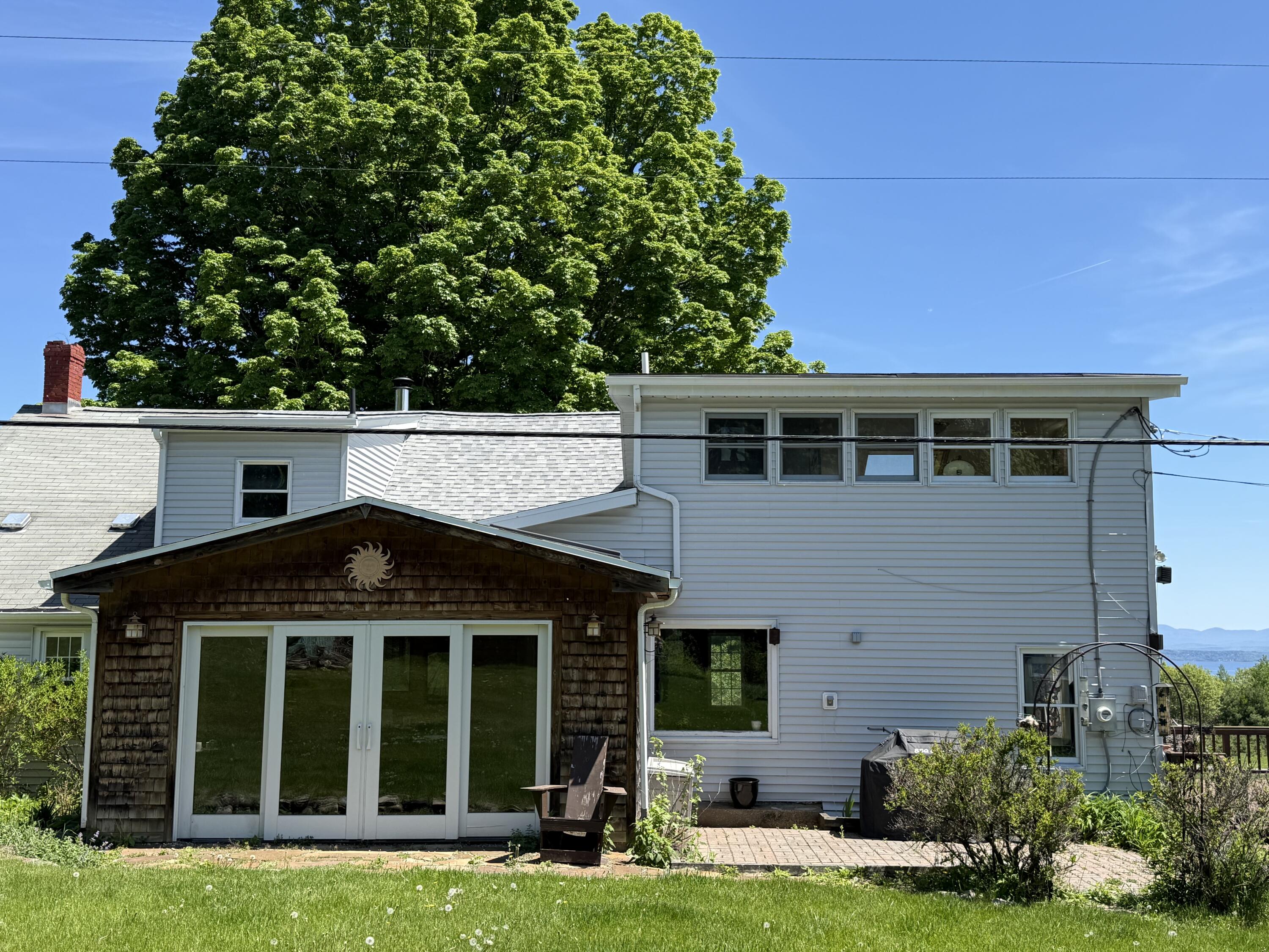 1001 Highland Road Keeseville, NY 12944 - Photo 46 of 79 Back of house - Sunroom & Patio