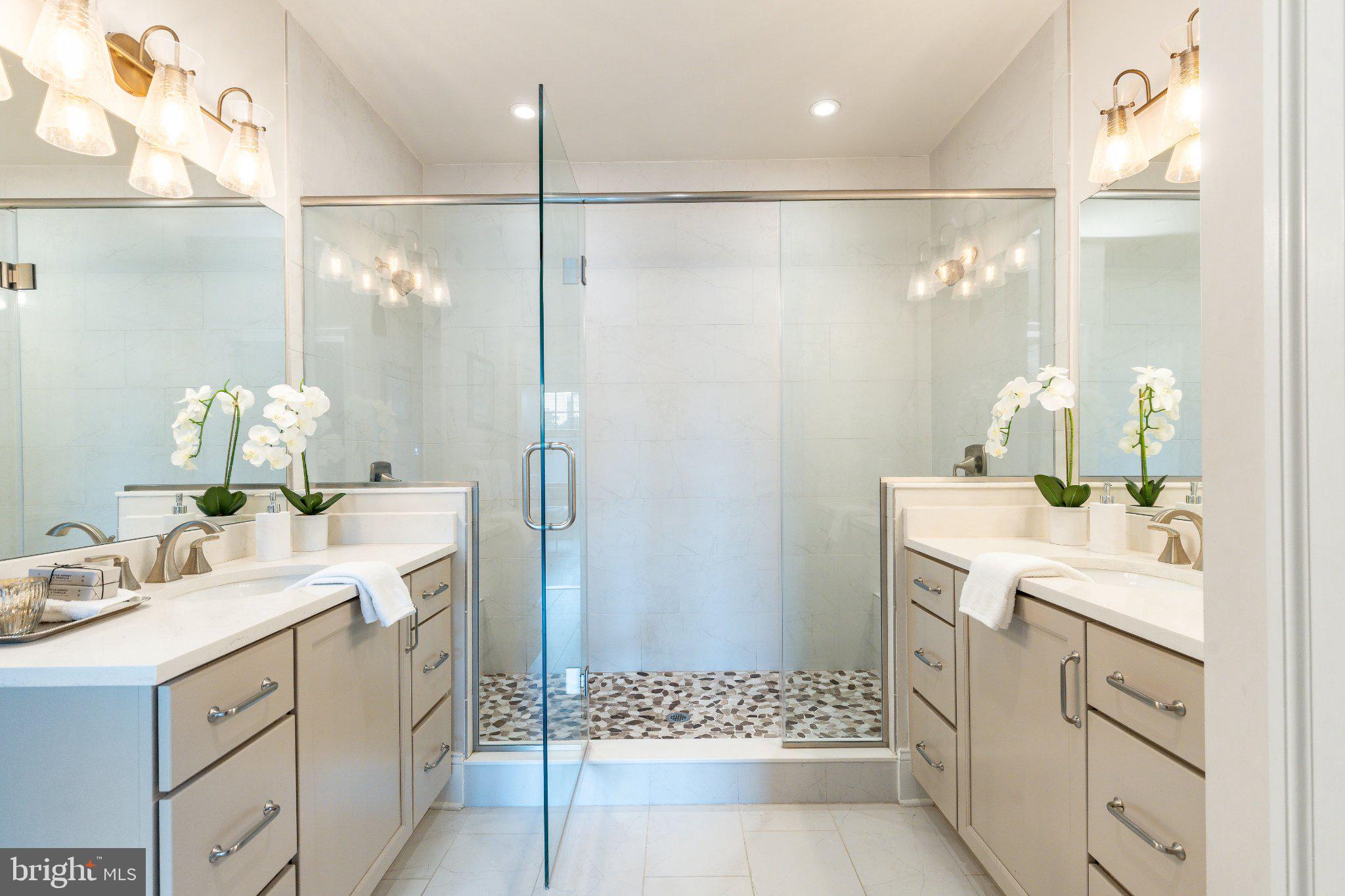 206 North Aberdeen Avenue, Unit D Wayne, PA 19087 - Photo 17 of 36 Elegant dual vanity bathroom retreat.