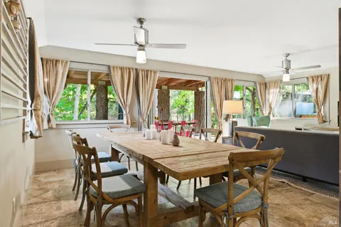 a view of dining room and livingroom with furniture