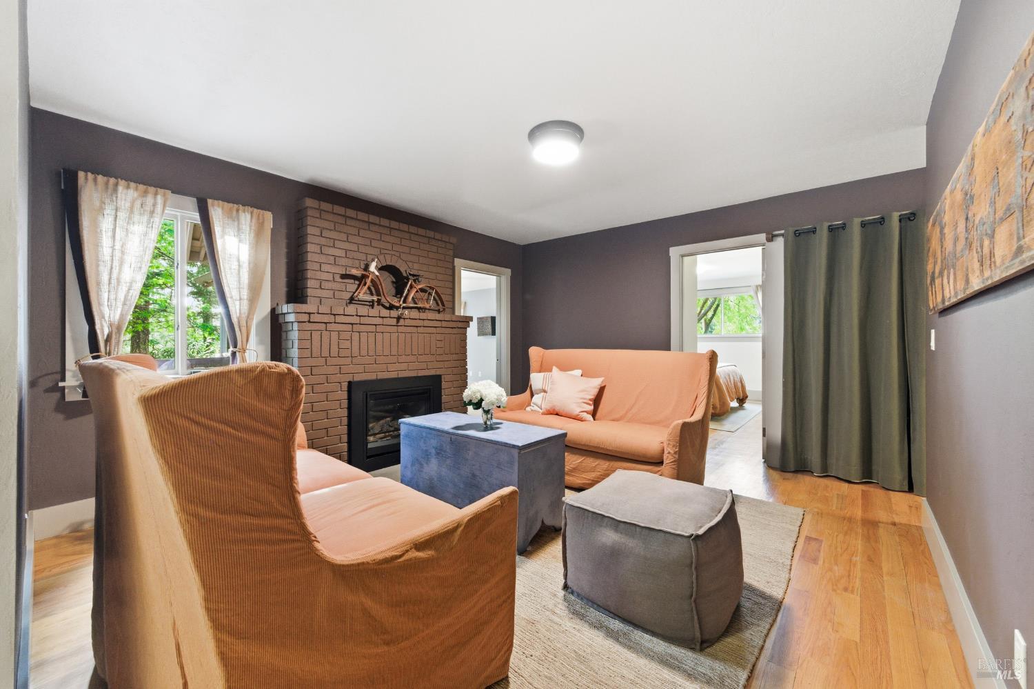 425 Cold Springs Road Angwin, CA 94508 - Photo 17 of 53 a living room with furniture and a fireplace