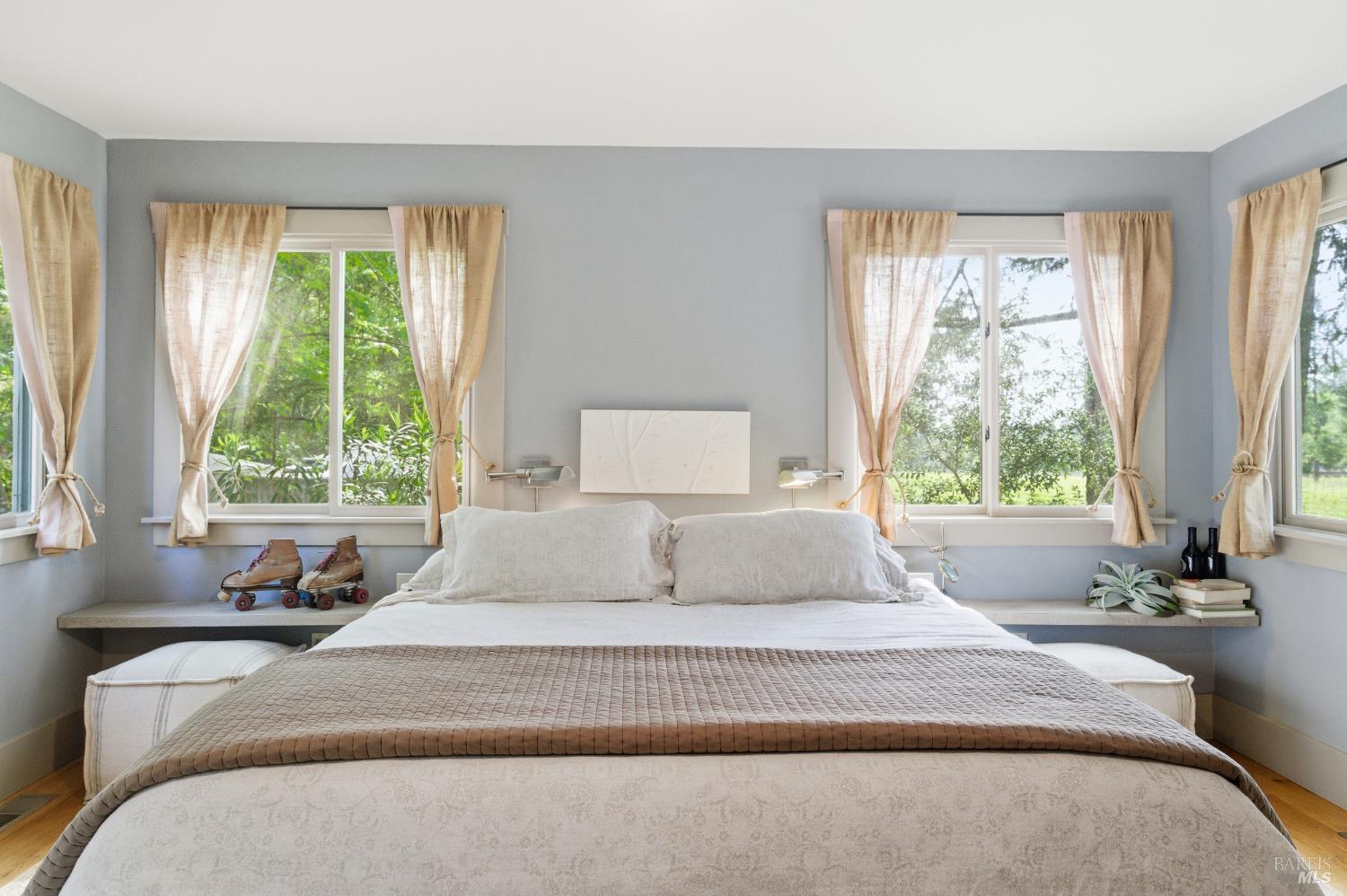 425 Cold Springs Road Angwin, CA 94508 - Photo 24 of 53 a bedroom with a bed and windows