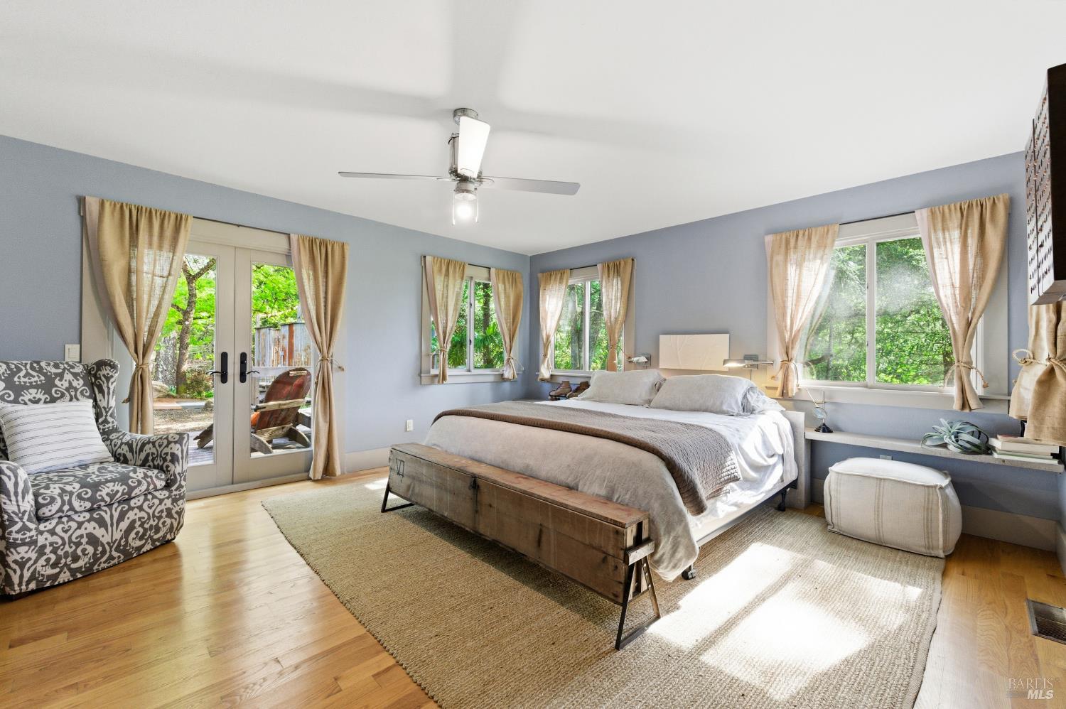 425 Cold Springs Road Angwin, CA 94508 - Photo 26 of 53 a spacious bedroom with a large bed and a couch