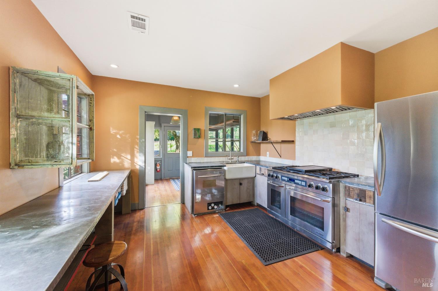 425 Cold Springs Road Angwin, CA 94508 - Photo 40 of 53 a kitchen with a stove and a wooden floors