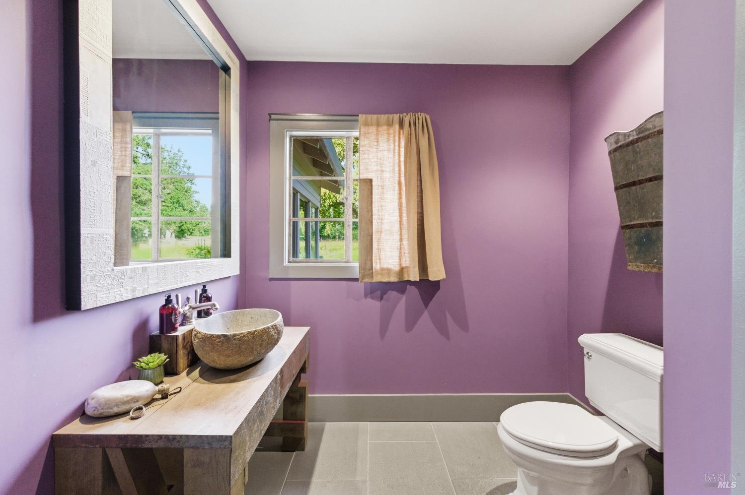 425 Cold Springs Road Angwin, CA 94508 - Photo 49 of 53 a bathroom with a sink a toilet and mirror