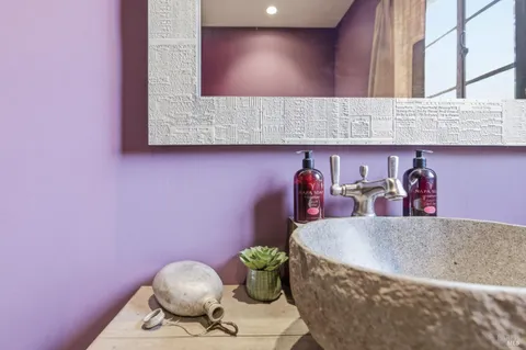a view of a city with lush green forest