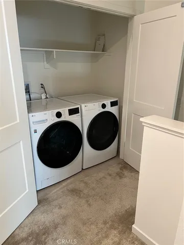 a view of a bathroom from a hallway