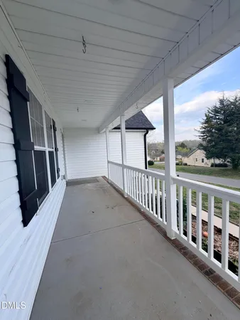 a view of staircase with wooden floor