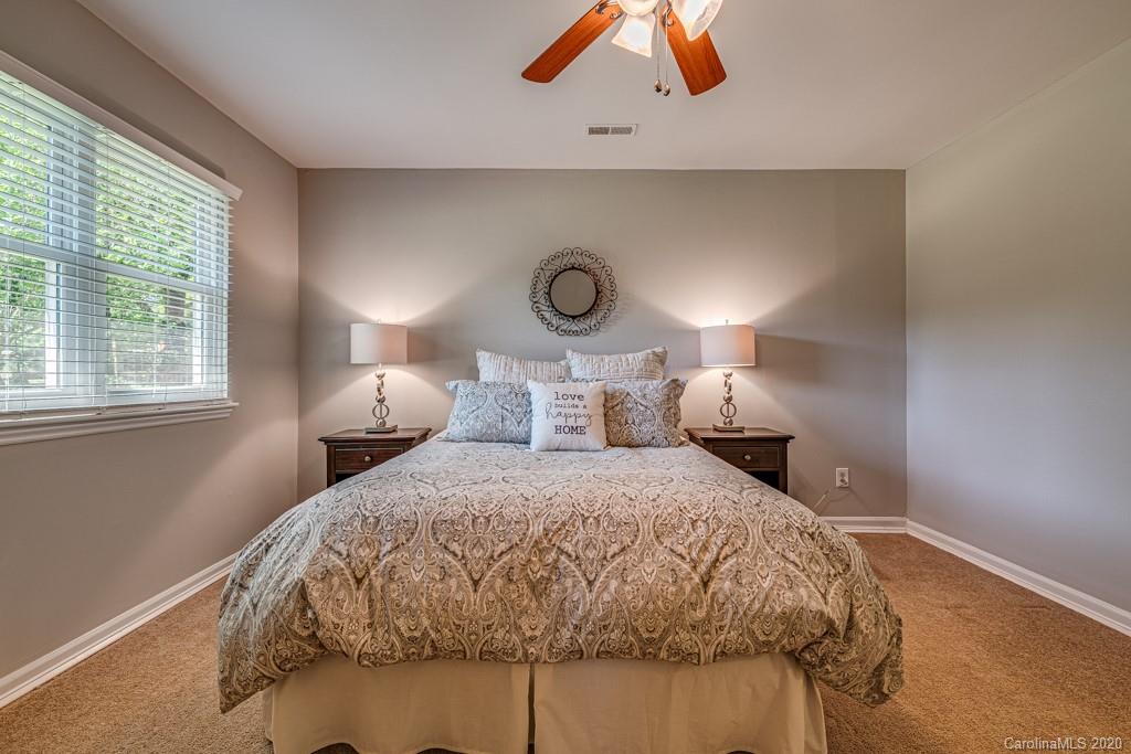 10125 Fairway Ridge Road Charlotte, NC 28277 - Photo 13 of 25 a bedroom with a bed and window