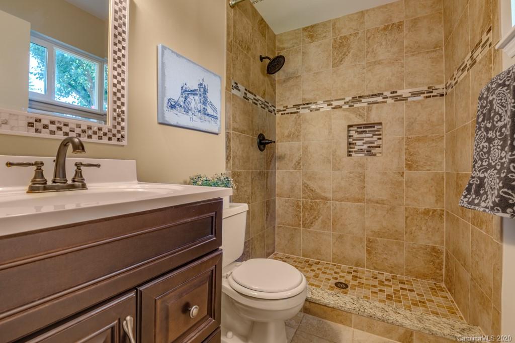 10125 Fairway Ridge Road Charlotte, NC 28277 - Photo 16 of 25 a bathroom with a sink toilet and shower