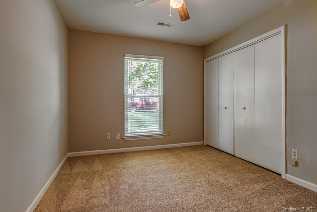 10125 Fairway Ridge Road Charlotte, NC 28277 - Photo 17 of 25 an empty room with a empty space and a window