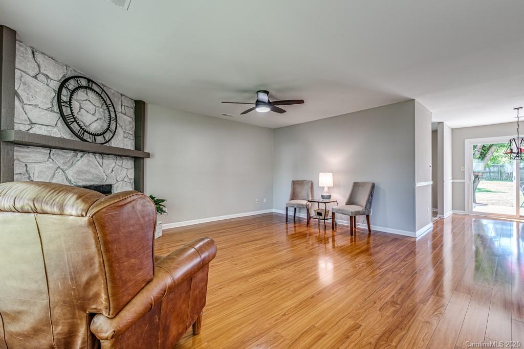 10125 Fairway Ridge Road Charlotte, NC 28277 - Photo 3 of 25 a living room with furniture and wooden floor
