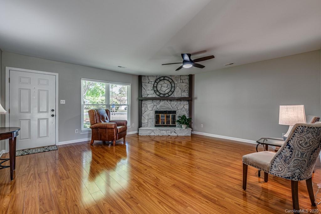 10125 Fairway Ridge Road Charlotte, NC 28277 - Photo 5 of 25 a living room with furniture and a wooden floor