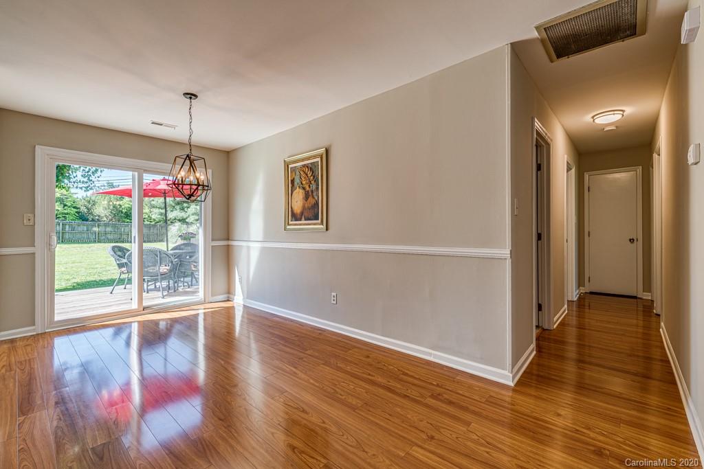 10125 Fairway Ridge Road Charlotte, NC 28277 - Photo 7 of 25 wooden floor in an empty room with a window