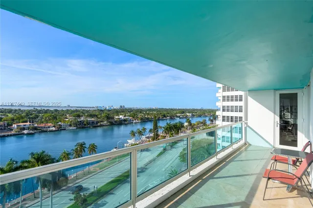 a view of swimming pool from a balcony