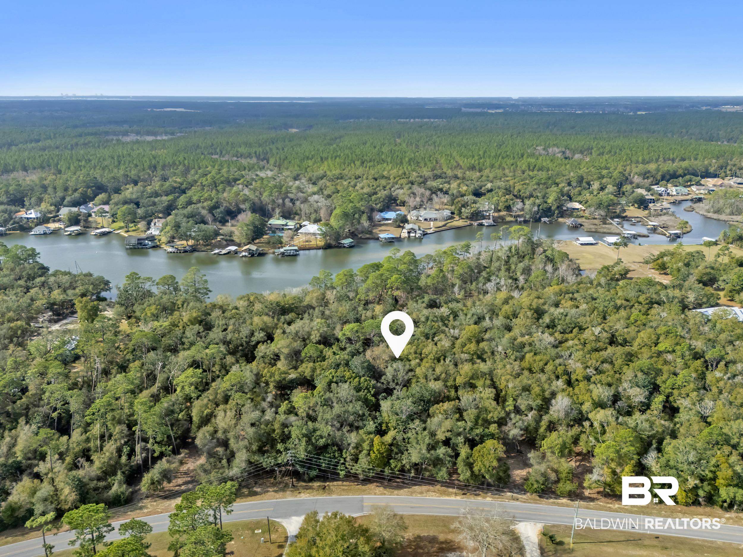0 County Road 97 Elberta, AL 36530 - Photo 22 of 29 Aerial view of property and surrounding area with a nearby body of water