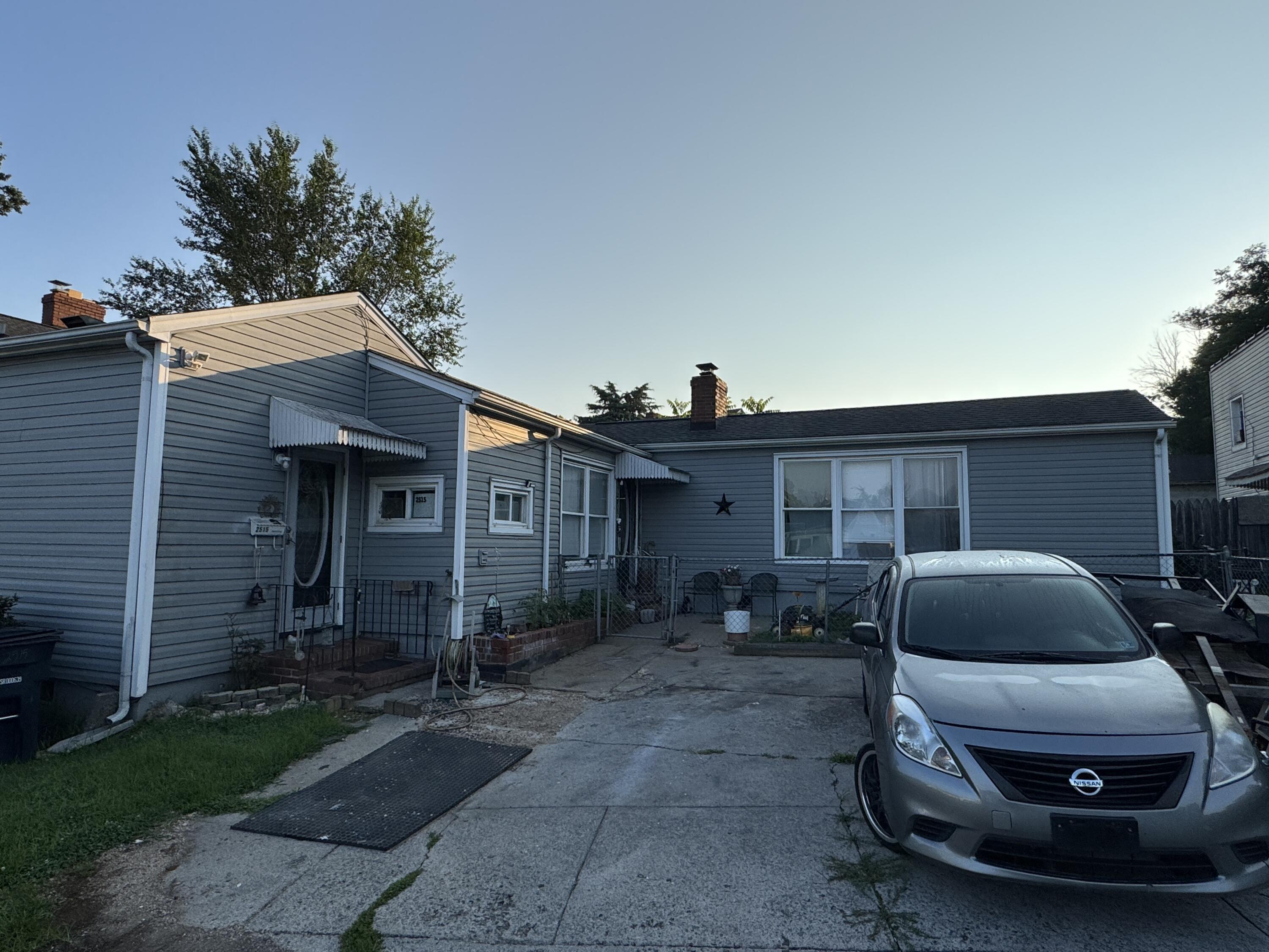 403 Liberty Road Northeast Roanoke, VA 24012 - Photo 20 of 20 a car parked in front of a house