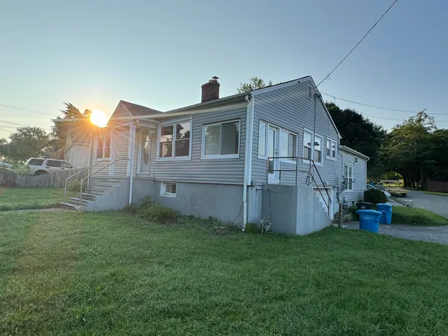 a view of a back yard of the house