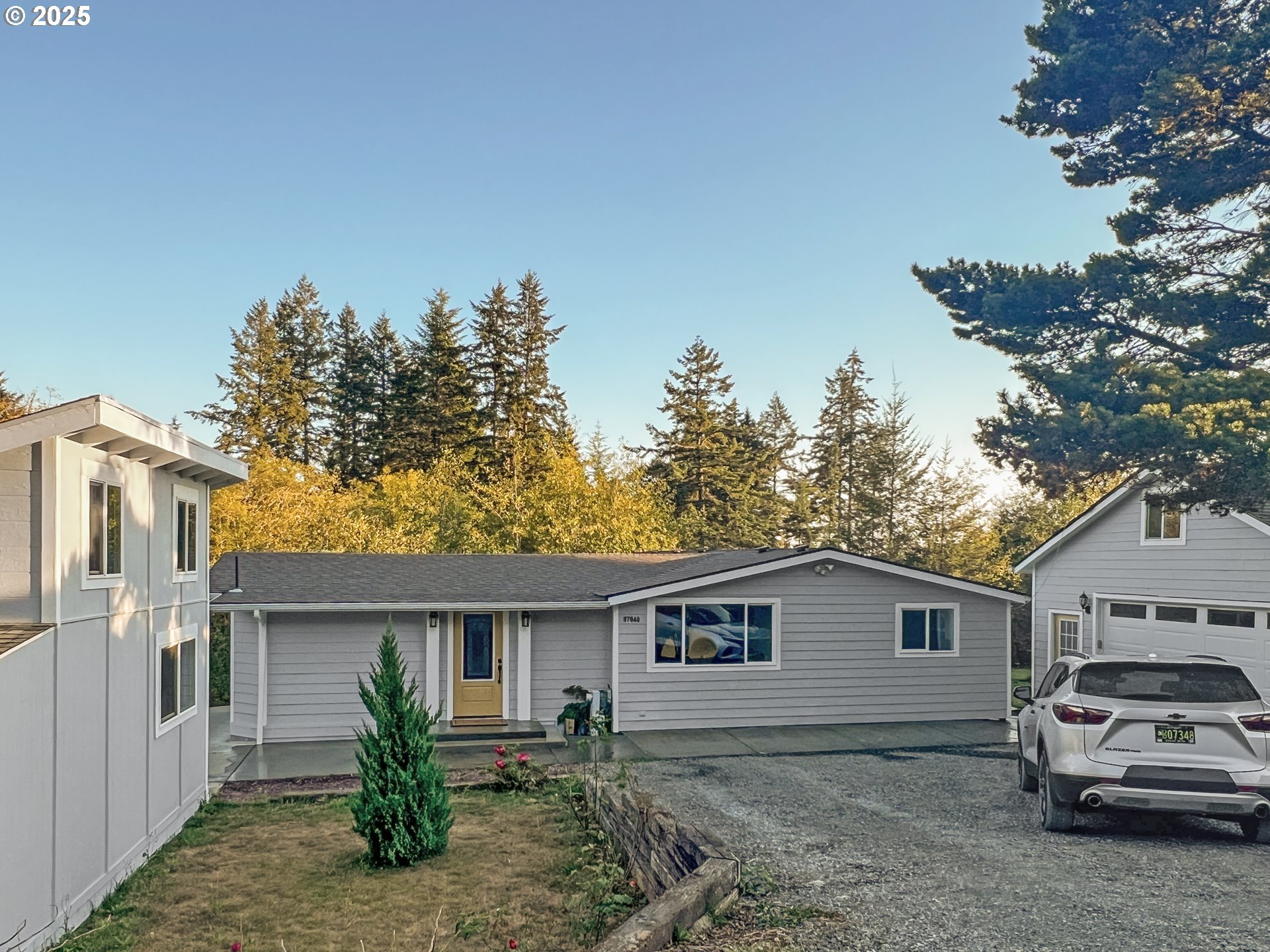 a house view with a backyard space