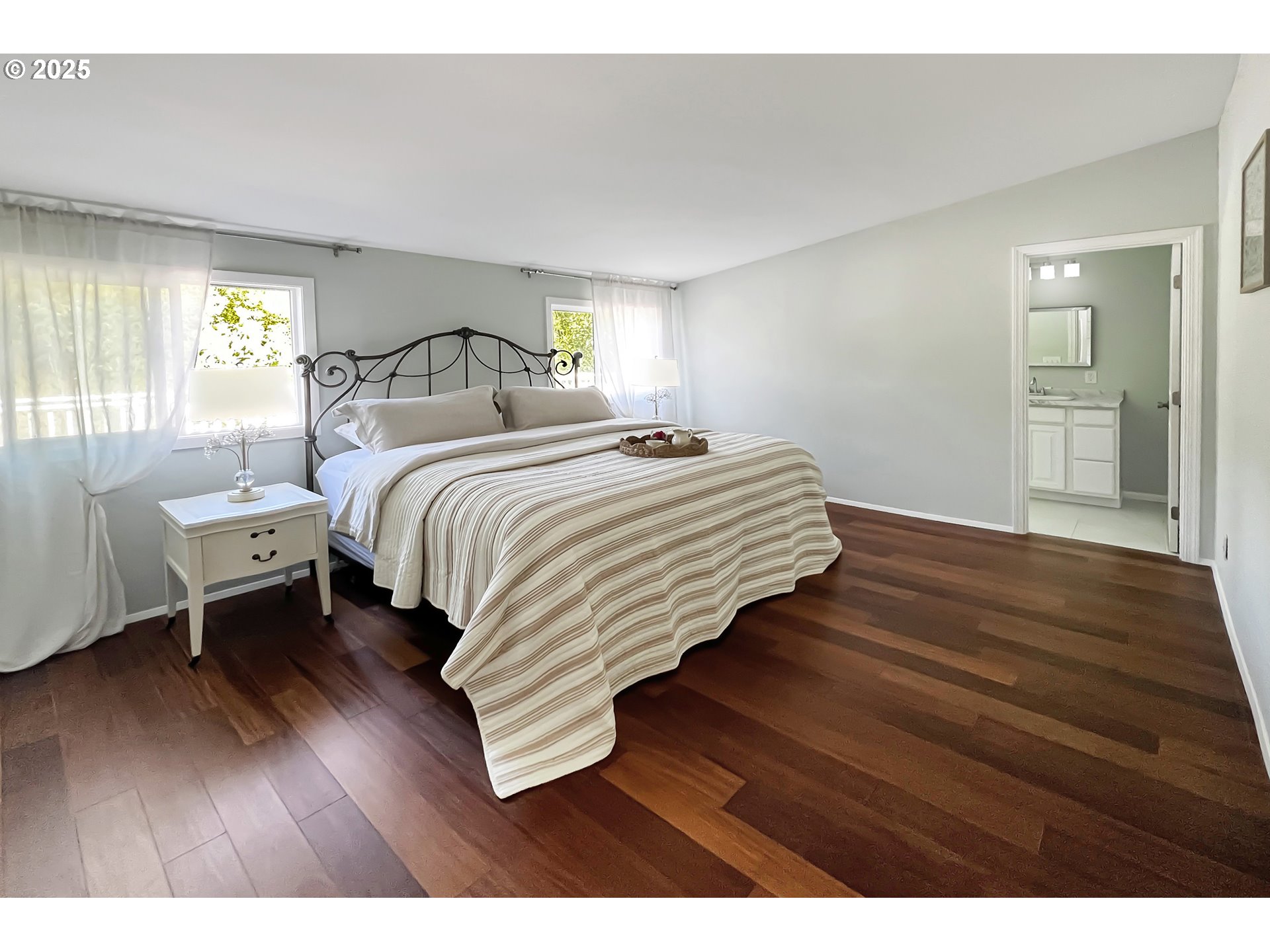 97040 Henderson Road Brookings, OR 97415 - Photo 15 of 36 a bedroom with a bed and a table