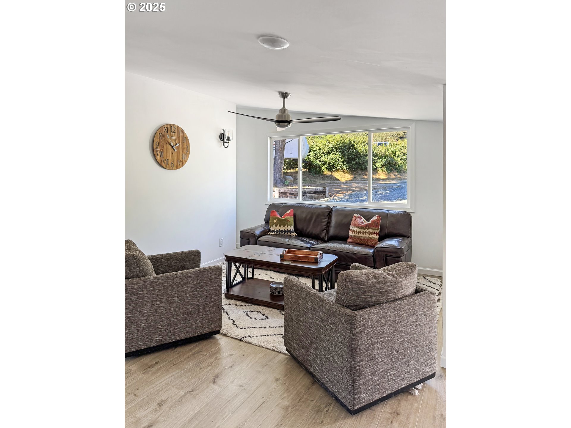 97040 Henderson Road Brookings, OR 97415 - Photo 19 of 36 a living room with furniture and a large window