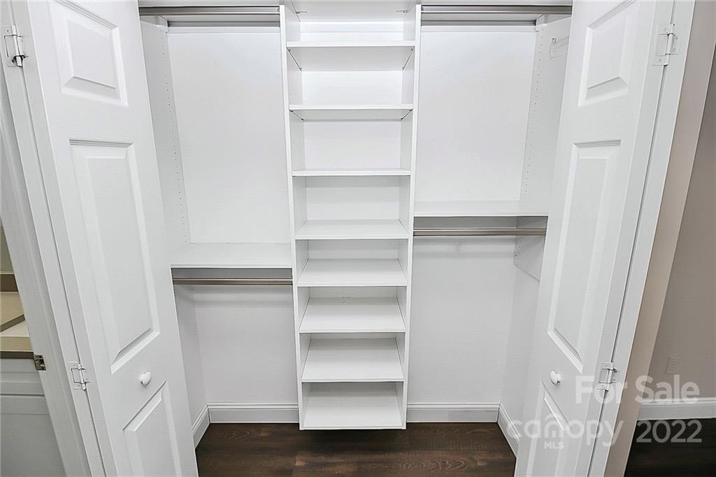 11630 Rabbit Ridge Road Charlotte, NC 28270 - Photo 19 of 32 a view of walk in closet with empty racks