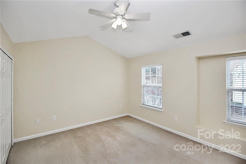 11630 Rabbit Ridge Road Charlotte, NC 28270 - Photo 24 of 32 a view of an empty room with a window