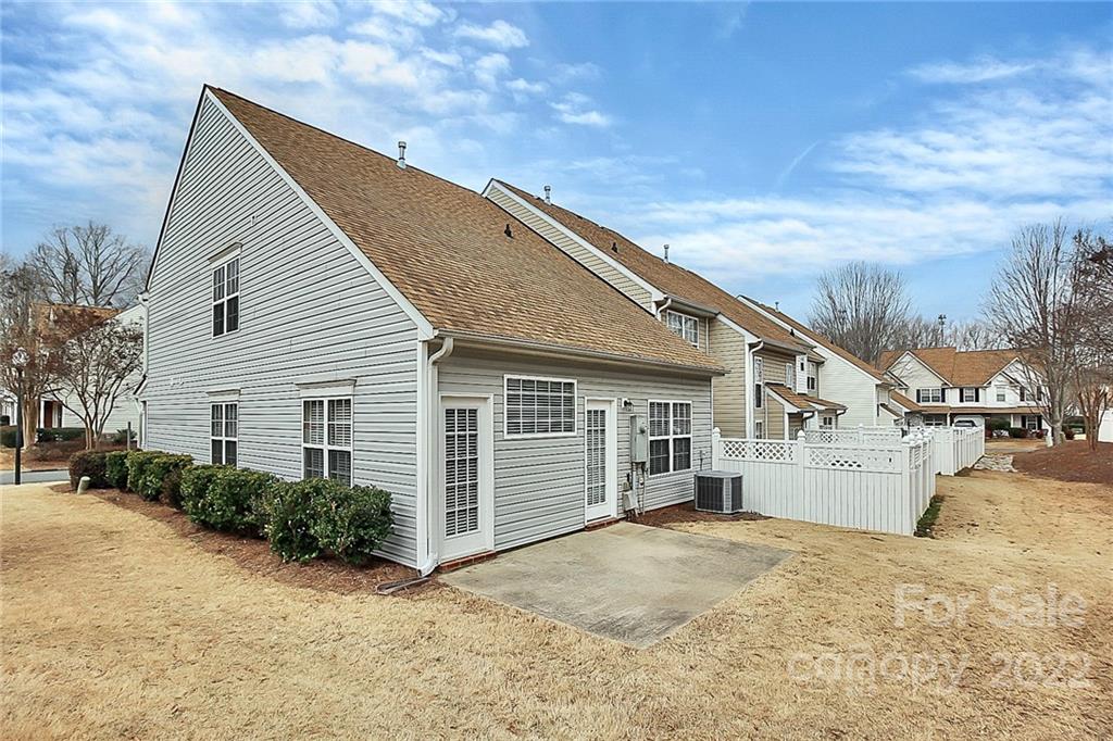 11630 Rabbit Ridge Road Charlotte, NC 28270 - Photo 30 of 32 a view of a house with a yard
