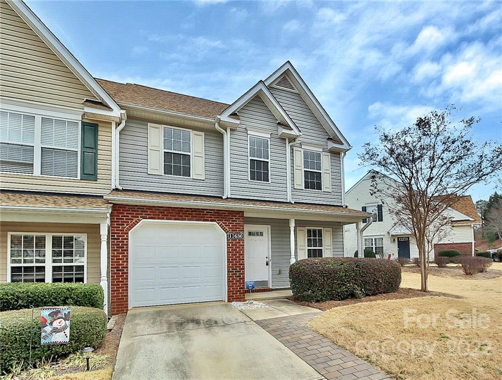 11630 Rabbit Ridge Road Charlotte, NC 28270 - Photo 3 of 32 a front view of a house with a yard