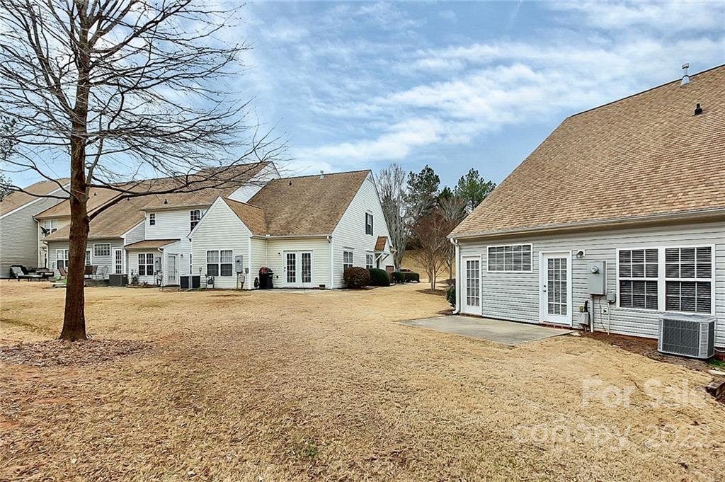 11630 Rabbit Ridge Road Charlotte, NC 28270 - Photo 31 of 32 front view of a house with a yard