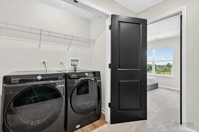 a utility room with dryer and washer