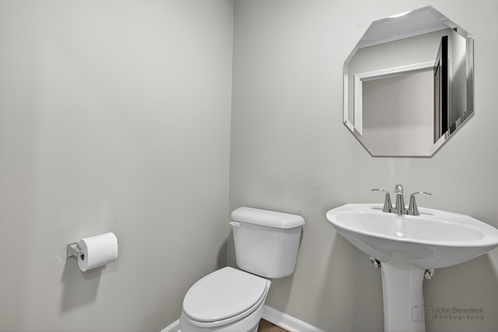 3209 Martini Street Mundelein, IL 60060 - Photo 9 of 24 a white toilet sitting next to a bathroom sink