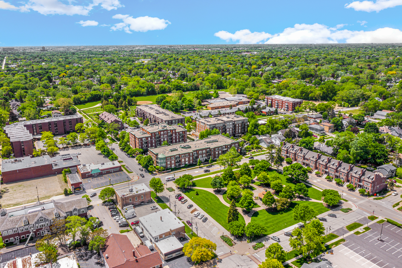 133 West Palatine Road, Unit 102 Palatine, IL 60067 - Photo 15 of 21 an aerial view of residential houses with outdoor space and street view