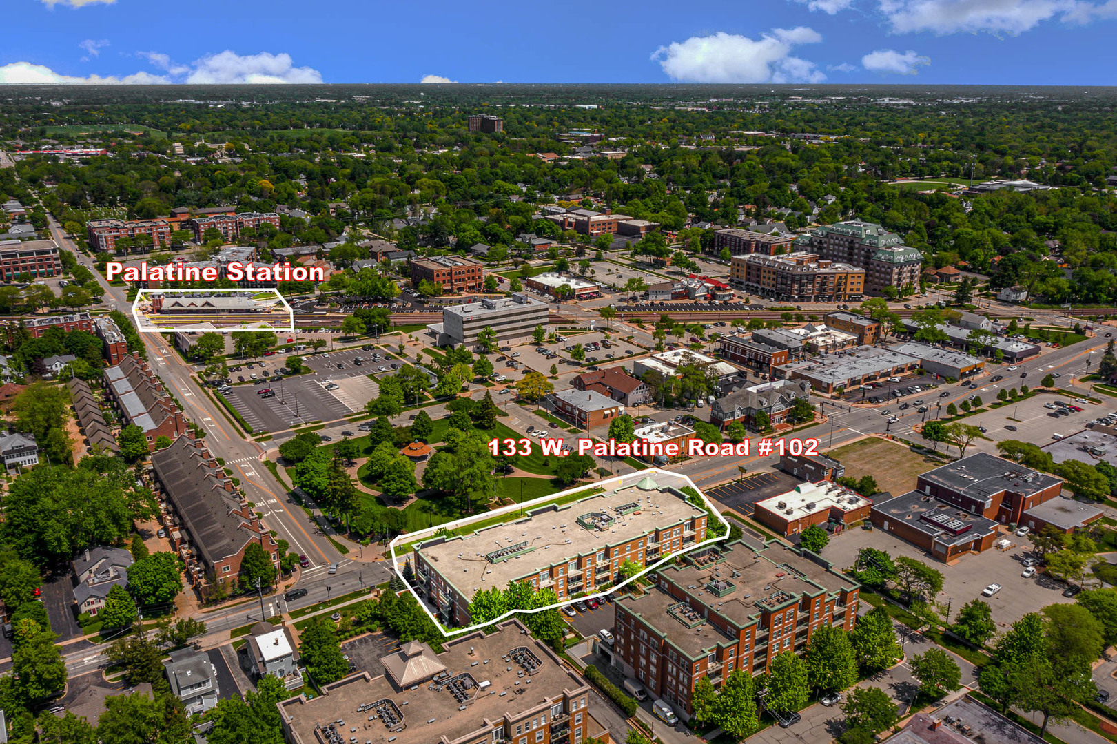 133 West Palatine Road, Unit 102 Palatine, IL 60067 - Photo 2 of 21 an aerial view of residential houses with outdoor space and trees