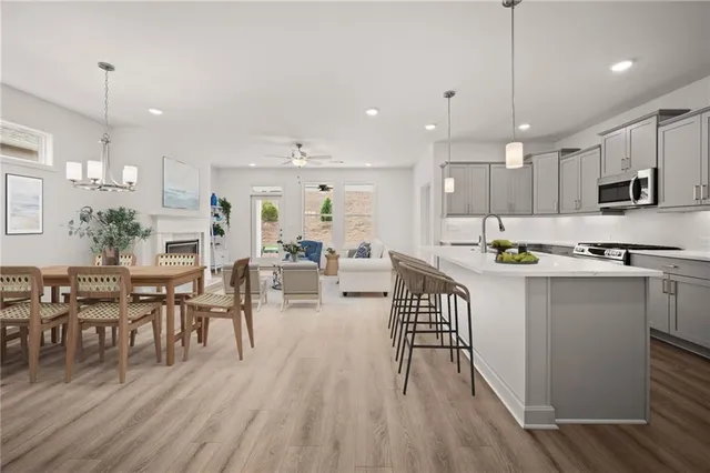 a bathroom with a shower and a sink