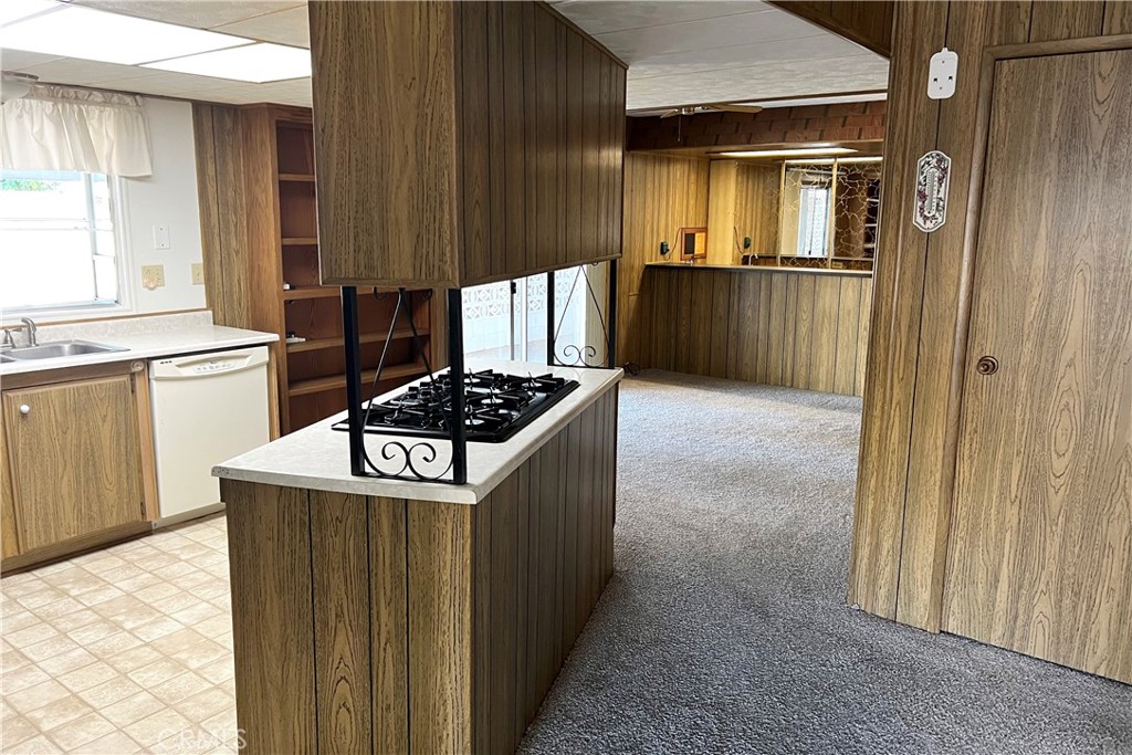 217 Hope Way Nipomo, CA 93444 - Photo 11 of 15 a kitchen with a stove and a refrigerator