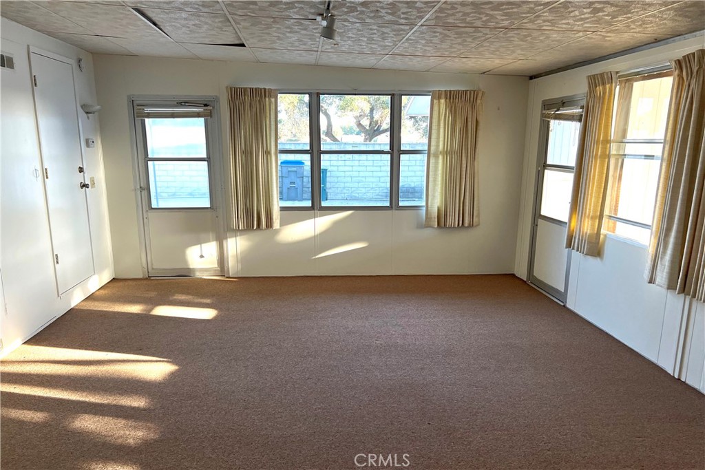 217 Hope Way Nipomo, CA 93444 - Photo 7 of 15 an empty room with windows